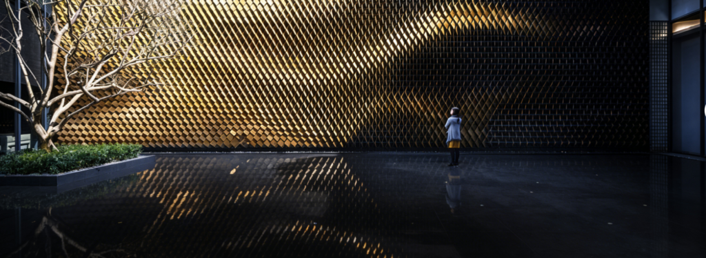 Custom stainless steel kinetic wind wall for architectural facade decoration